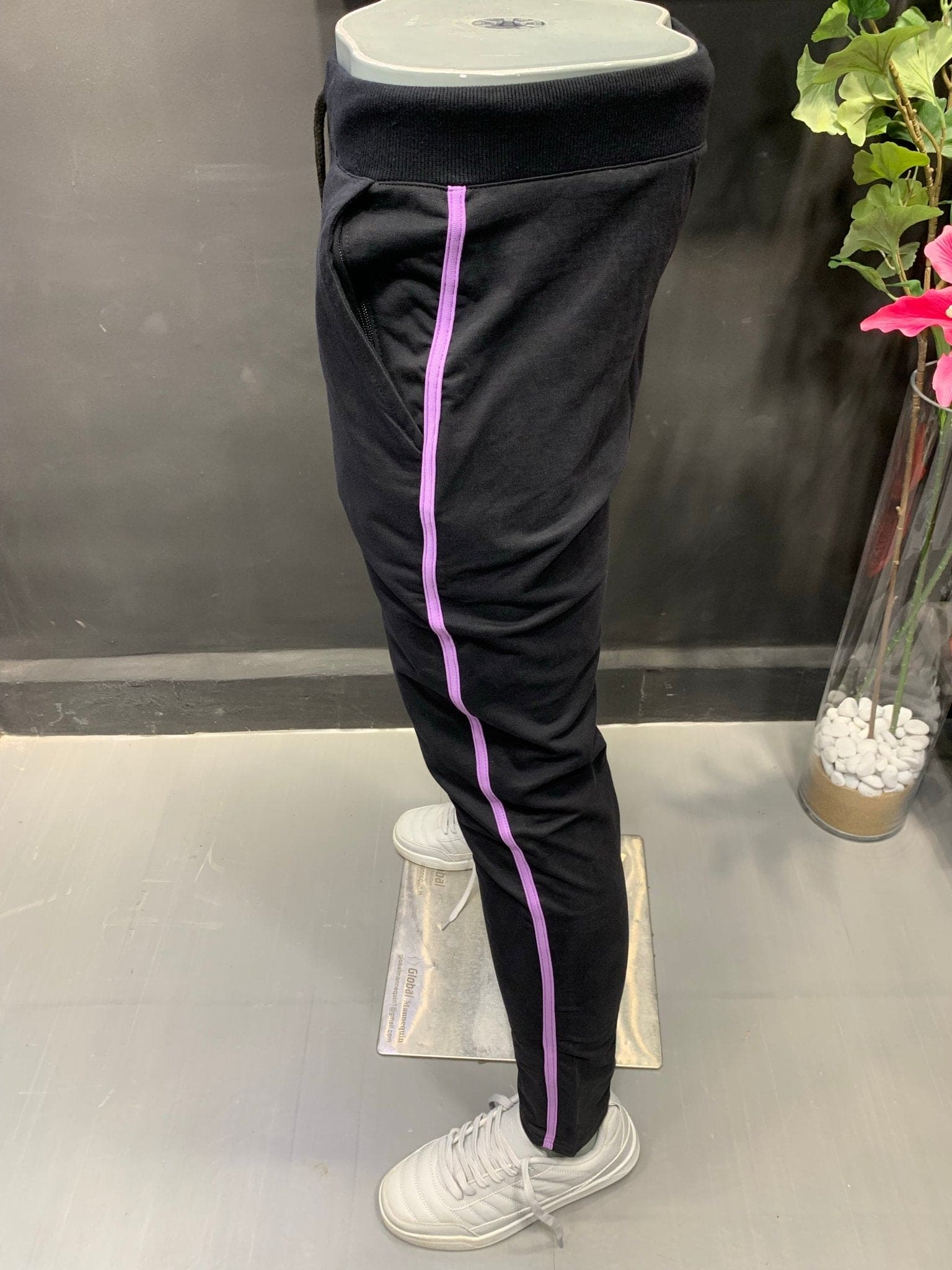https://www.likera.co.in/cdn/shop/products/black-lycra-track-pant-with-piping-597559.jpg?v=1702682494&width=1946